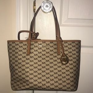 Brand new Michael Kors purse with wristlet